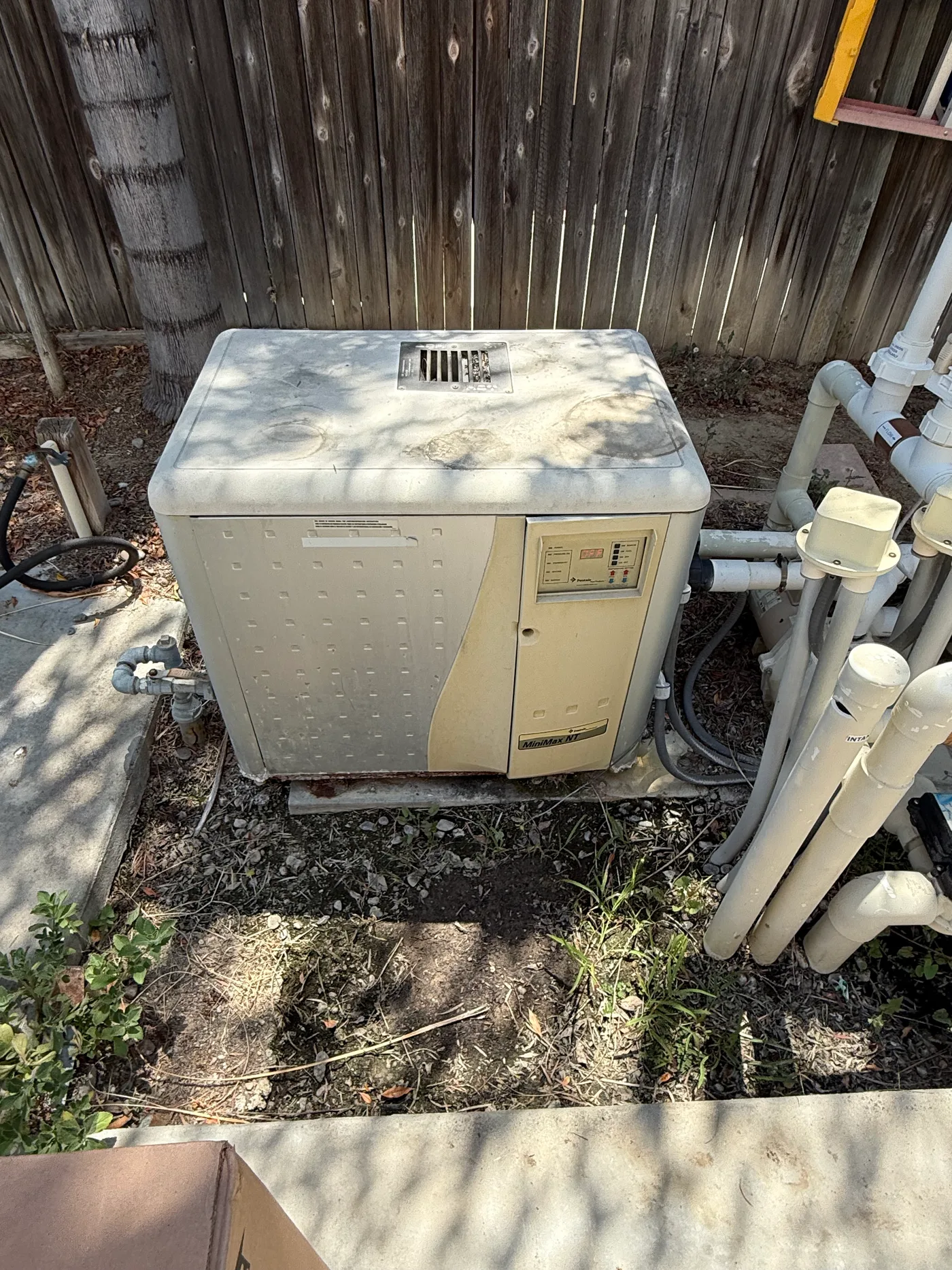 Pool heater replacement on the equipment pad